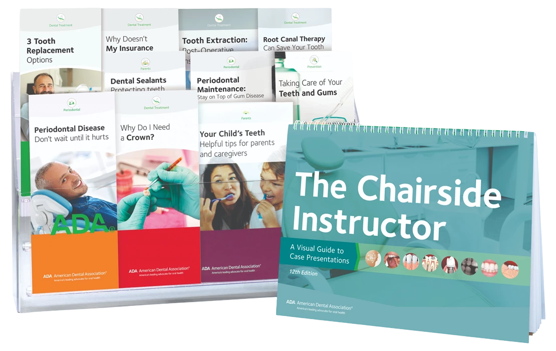 Standing clear display rack with various ADA patient education brochures next to propped up copy of The Chairside Instructor resource