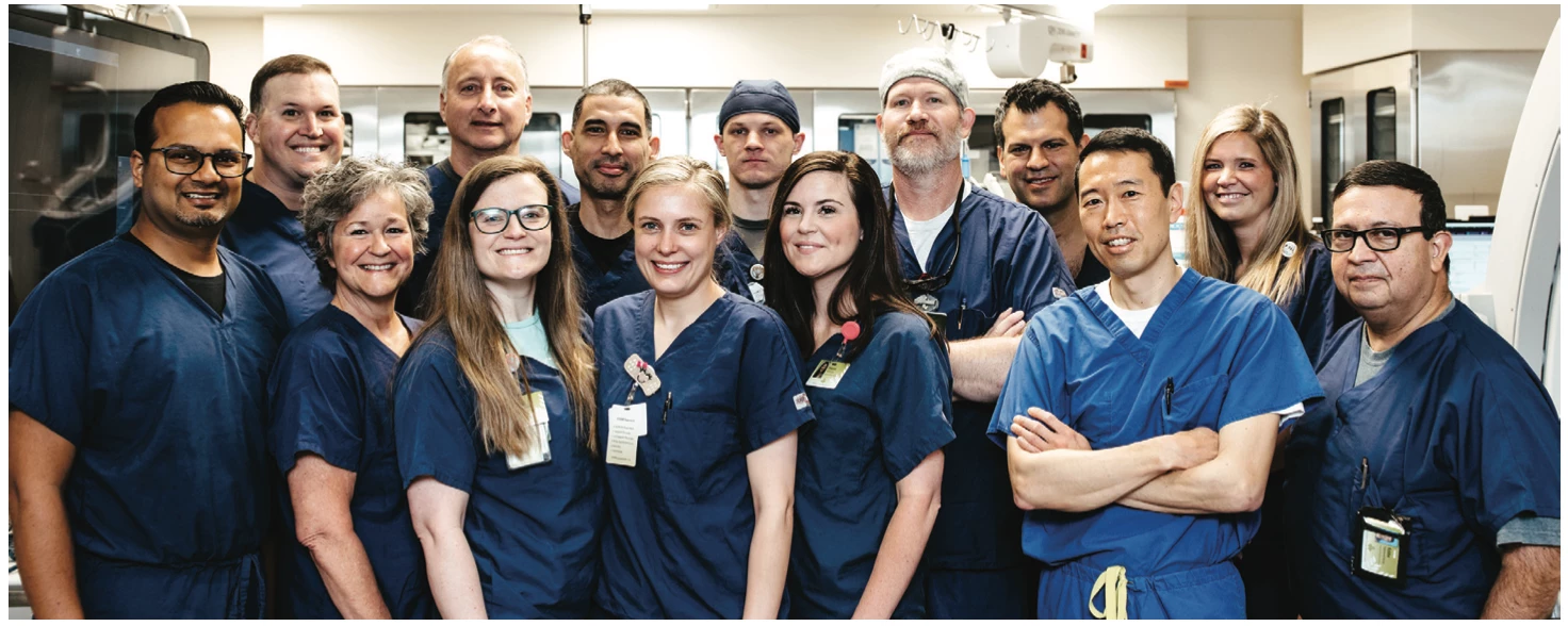 Front row, left to right: Shalabh Chandra, MD, MPH; Pam Jarrell, RRT; Amber Cesak, BSN, RN; Katie Peeso, BSN, RN; Sharon Dickson, RT(R); Joon Ahn, MD, FHRS; Eddie Montero, BSN, RN. Back row, left to right: Keith Adkins, ANP-BC; Stephen Prater, MD, FACC, FHRS; Carlos Rodriguez, PMDC, CCEMTP; Cole Dann, BSN, RN; Jason Anderson, PMDC; David Weisman, MD, FHRS; Erin Brooks, BSN, RN, EP supervisor. Not pictured: Kayla Lovell, BSN, RN, RCES; Mitch Rider, PMDC, RCES; Kathryn Christie, RT(R); Taylor Abu-Alrub, PA-C; Mandy Harris, NP-C; Kayla Rylee, ACNP-BC; Matthew McKinney, CRT, manager; Heather Mitchum, MBA-HCM-BSN, RN, NEA-BC, invasive cardiology director; Gail Witten, NP.