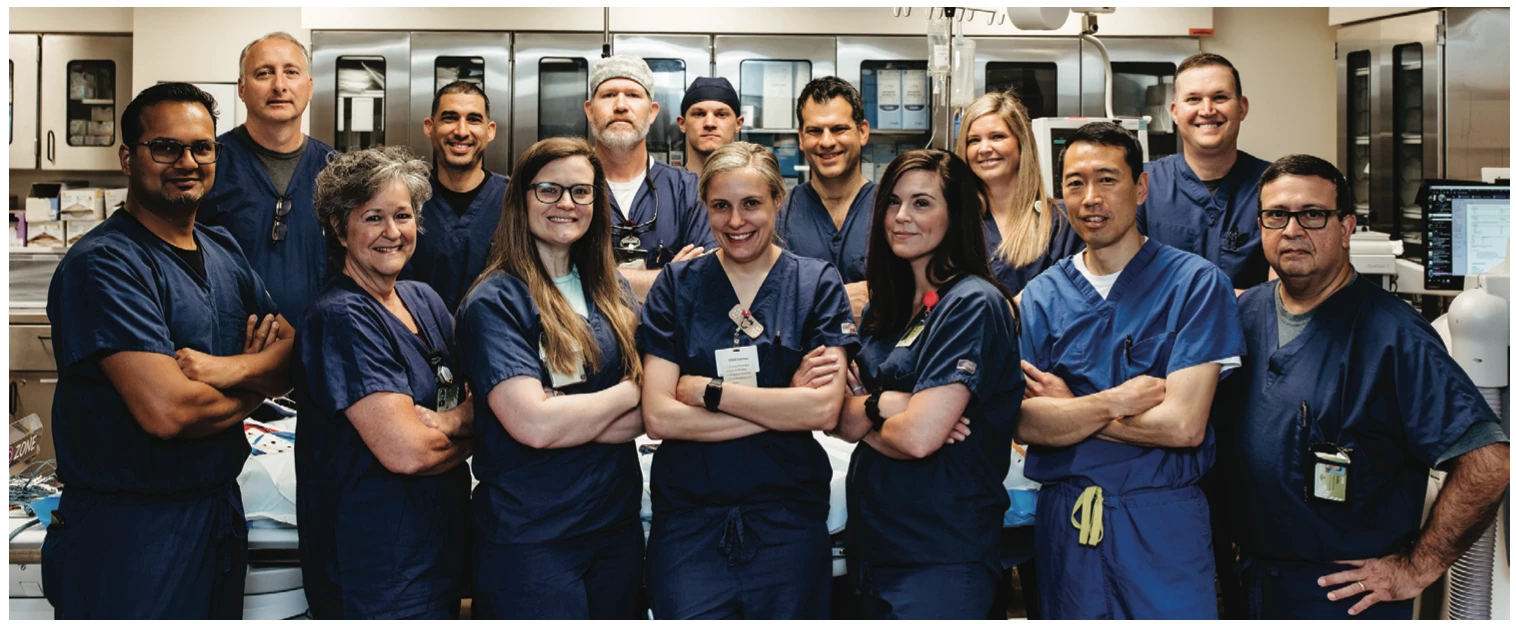 Front row, left to right: Shalabh Chandra, MD, MPH; Pam Jarrell, RRT; Amber Cesak, BSN, RN; Katie Peeso, BSN, RN; Sharon Dickson, RT(R); Joon Ahn, MD, FHRS; Eddie Montero, BSN, RN. Back row, left to right: Stephen Prater, MD, FACC, FHRS; Carlos Rodriguez, PMDC, CCEMTP; Jason Anderson, PMDC, NRP; Cole Dann, BSN, RN; David Weisman, MD, FHRS; Erin Brooks, BSN, RN, EP supervisor; Keith Adkins, ANP-BC. Not pictured: Kayla Lovell, BSN, RN, RCES; Mitch Rider, PMDC, RCES; Kathryn Christie, RT(R); Taylor Abu-Alrub, PA-C; Mandy Harris, NP-C; Kayla Rylee, ACNP-BC; Matthew McKinney, CRT, manager; Heather Mitchum, MBA-HCM-BSN, RN, NEA-BC, invasive cardiology director; Gail Witten, NP.